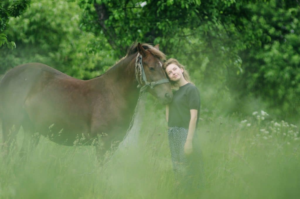 restore mental health. girl. nature. green. horse. recovery